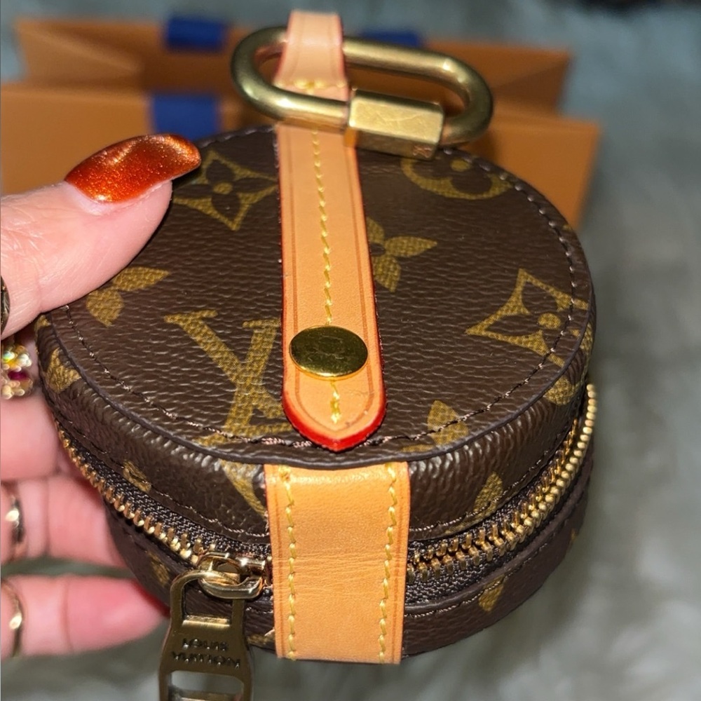 Louis Vuitton Monogram Mini Bag with Gold and tan accent! AirPod case!